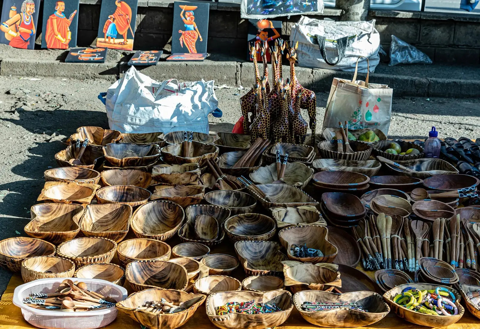 Carved wooden bowls and spoons at a Nairobi market