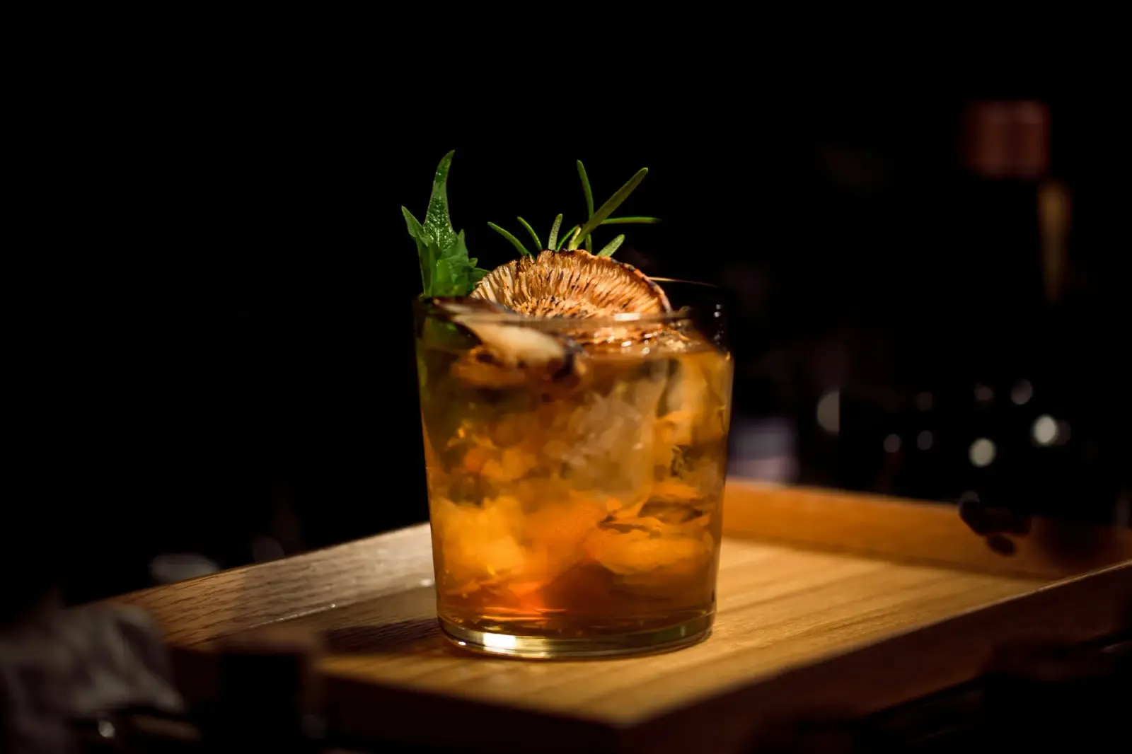 A cocktail being served at the bar
